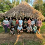 a group of EPP students and faculty with BFREE employees in Belize