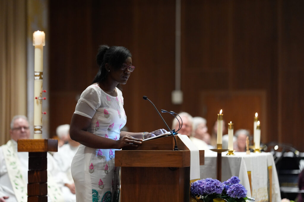 Michelle Odoi presents her research at a conference.